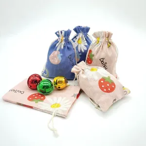 Floral cotton drawstring bags with strawberry and daisy prints for gift jewelry storage