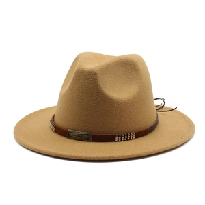 Detail of khaki wool fedora with brown leather belt, metal rivets and western buckle
