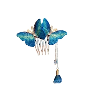 Elegant blue embroidered butterfly hair comb with long silver tassels and beads