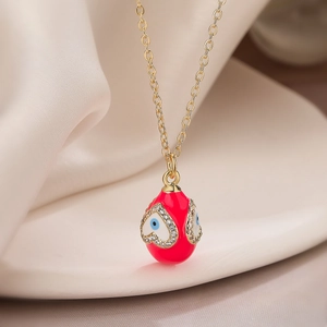 18K gold plated evil eye necklace with red enamel heart pendant and zircon accents