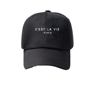 Classic black cotton baseball cap with white C'EST LA VIE PARIS print and adjustable strap