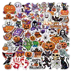 Flat lay of laser stickers with pumpkin, ghost, and witch designs for Halloween decor