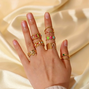 Stackable 18K gold plated stainless steel rings with colorful enamel and gemstone inlay