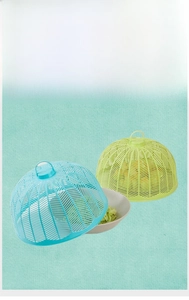 Close-up of sky blue and light green mesh food covers with top handles and high dome