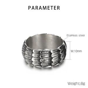 Macro shot showing 10mm dragon scale texture on punk stainless steel mens ring