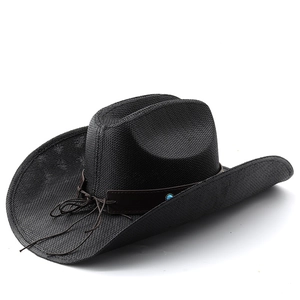 Close-up of black straw cowboy hat featuring a brown leather band and turquoise bead