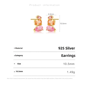Detailed view of S925 sterling silver gold earrings with three colorful stacked zircons