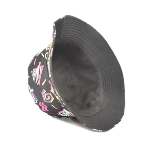 Detail showing the colorful geometric diamond pattern and black lining of the bucket hat
