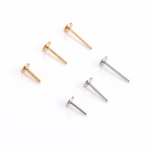 G23 titanium threadless labret posts in silver and gold tones with various size options