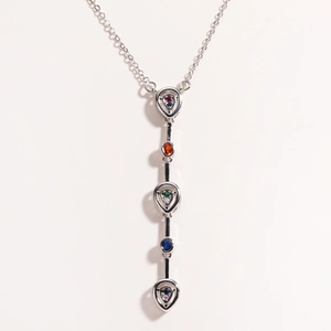 Detailed view of silver Y-shaped necklace with vibrant multicolored gemstone pendant