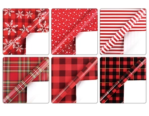 Six different patterns of red Christmas gift wrapping paper including plaid and snowflakes