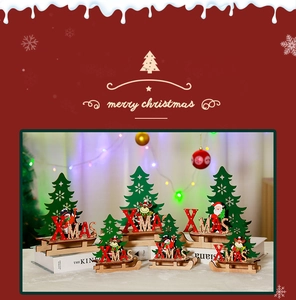 Detail of wooden XMAS sled ornament with Santa, reindeer and pine tree festive decor