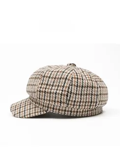 Side view of retro brown houndstooth newsboy cap with classic eight-panel design