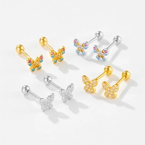Macro shot of S925 silver butterfly stud earrings set with colorful zircon stones