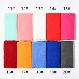 Detailed grid view of pleated cotton linen scarves in various pastel and bold colors
