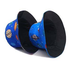 Blue reversible bucket hat with space planet prints and sun protection for women
