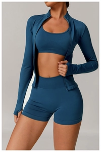 Three-piece seamless peacock blue yoga set with high-waist shorts and zip-up jacket