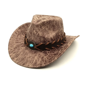 Vintage western cowboy hat in brown marble texture with turquoise band and wide brim