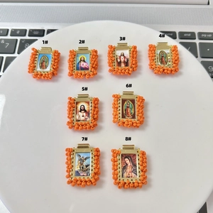 Handmade religious square pendants with orange beaded borders for DIY jewelry making