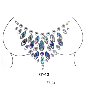 Detailed view of colorful iridescent acrylic breast jewels XT-12 in V-shaped pattern