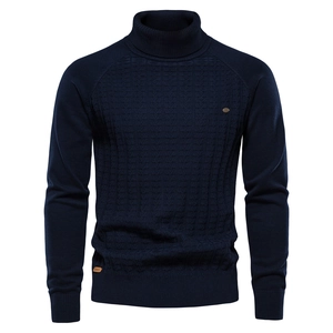 Men's dark blue turtleneck cable knit sweater in slim fit with textured pattern