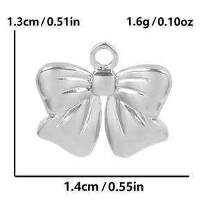Detail view of silver bow pendant with 1.3cm height and 1.4cm width dimensions