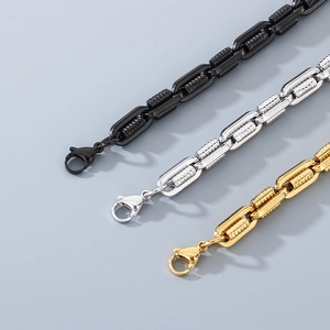 Unisex stainless steel spring link bracelet with industrial texture in black gold silver