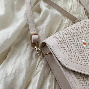 Beige straw phone bag with lace daisy embroidery and adjustable PU leather strap