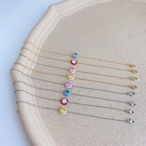 Detail showing S925 sterling silver enamel bracelets in macaron colors and zircon pendants