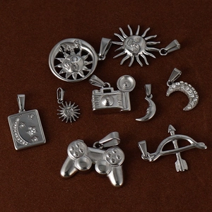 Set of silver DIY metal charms featuring celestial sun moon stars and camera game controller