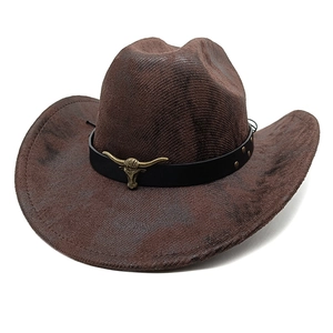 Distressed brown western cowboy hat with metal bull head buckle and studded black band