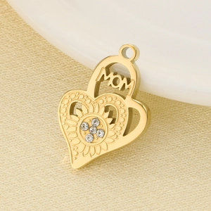 Detail of gold heart pendant with MOM lettering and sunflower motif with crystals