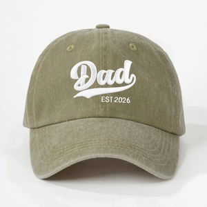 Vintage washed olive cotton baseball cap featuring Dad EST 2026 white embroidery