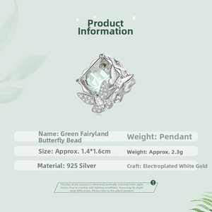Detail of s925 silver green butterfly charm with cubic zirconia and platinum plating