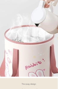 Detail of pink folding foot spa bucket with water steam and rabbit pattern design