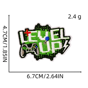 Macro shot of LEVEL UP! game controller embroidery patch showing 4.7cm x 6.7cm dimensions