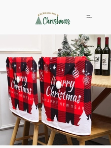 Detail of red buffalo plaid Christmas chair covers with white snowflake and cedar prints