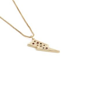 Golden lightning bolt necklace with colorful rhinestones on a minimalist chain