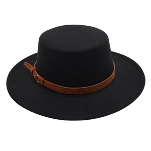 Detail of black wool felt boater hat with a brown leather strap and metal buckle