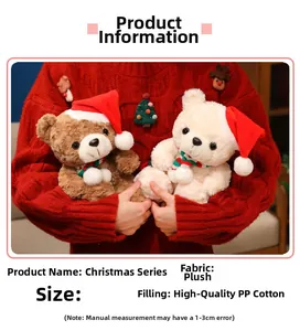 Detail of plush Christmas teddy bears with red scarves and hats in cozy holiday scene