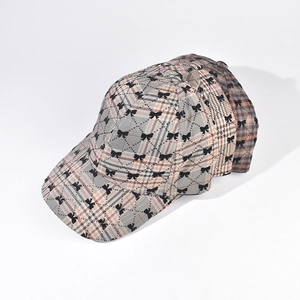 Three stacked checkered baseball caps with black bow prints for men and women