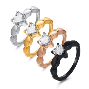 Fashionable heart-shaped stainless steel rings with zircon stones in four metallic colors