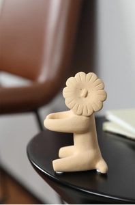 Detailed view of Nordic ceramic lion sculpture with matte texture and anti-slip base