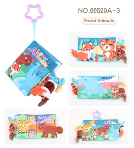 Detail of forest animal cloth book with textured 3D tails and hanging star hook