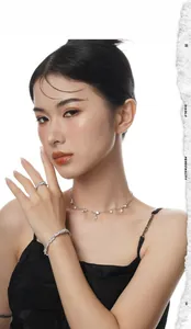 Exquisite S925 silver necklace with pearls and rhinestones shown on a model