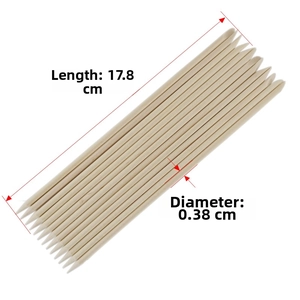 Detail view of 17.8cm long orange wood sticks for nail art with size dimensions