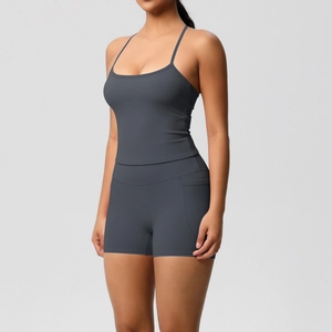 Close-up of high-waist yoga shorts with side pockets and matching slim-fit strap top