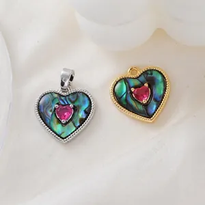 Heart-shaped abalone shell pendant with pink zircon in 18K gold plated finish