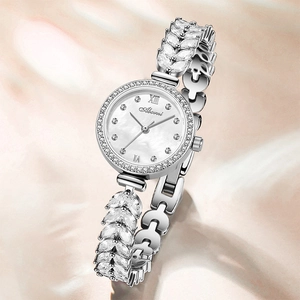 Elegant silver mermaid bracelet watch for women featuring leaf-shaped crystal links