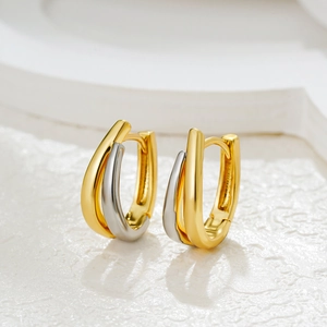 Minimalist U-shaped geometric hoop earrings in polished gold and silver two-tone metal finish